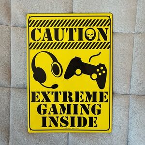 “Caution Extreme Gaming Inside” metal sign